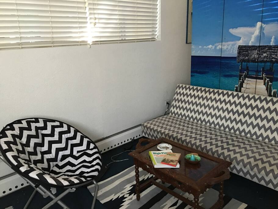 The sofa is a futon that converts into a second bed. Perfect if you're traveling with a friend and need a separate bed and sleeping area.