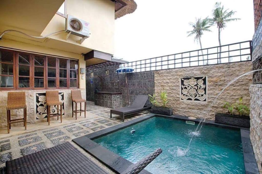 Kitchen facing pool .you can cook while watching over your children at the same time