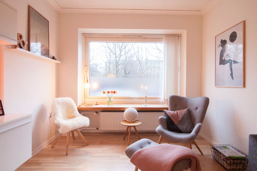 Cosy corner in the living room - or sit in the window and enjoy the nature.