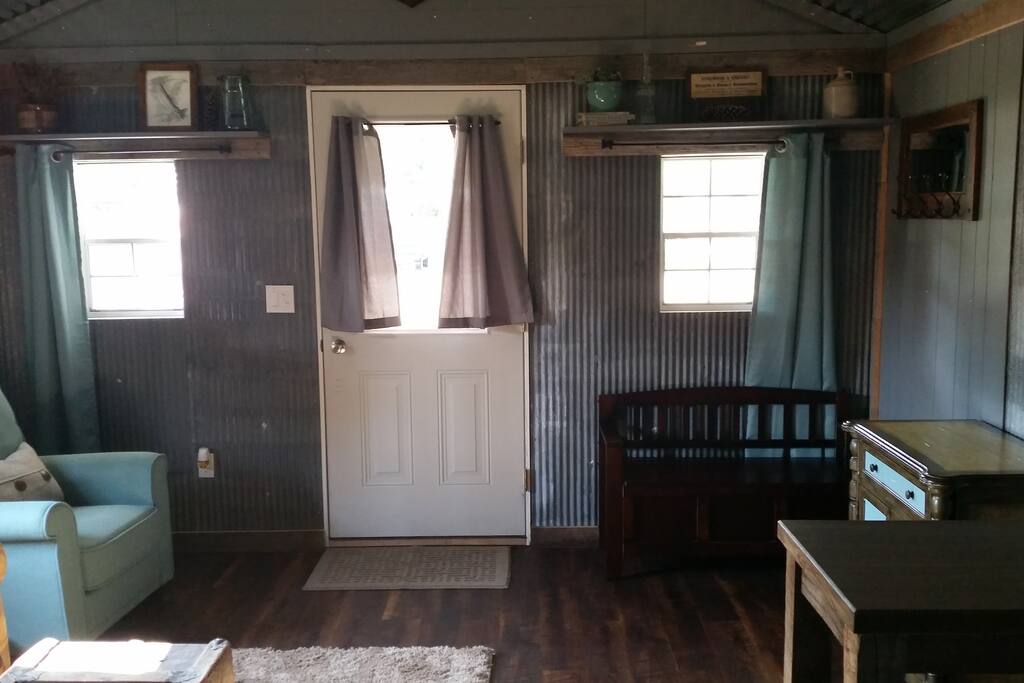 View of front door from kitchen.