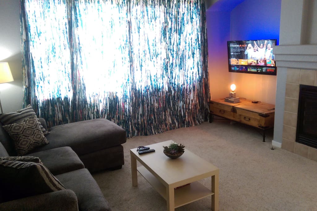 living area with HBO, NETFLIX, and AMAZON PRIME