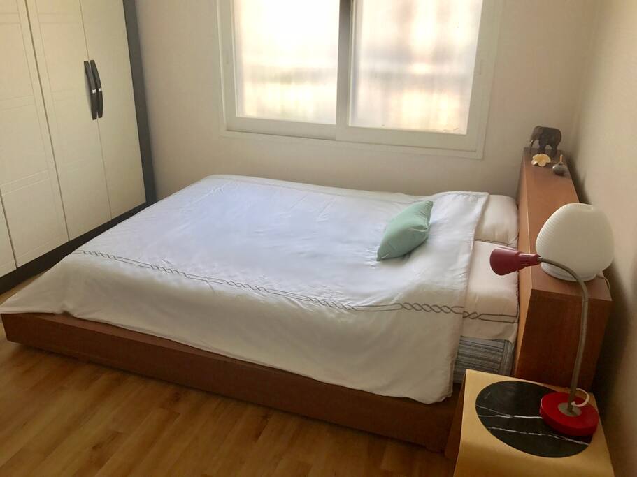Queen sized comfortable bed in the master room