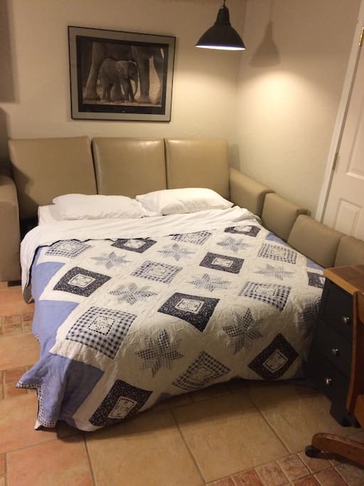 This is the rollout bed and it is in its own separate room with the kitchen