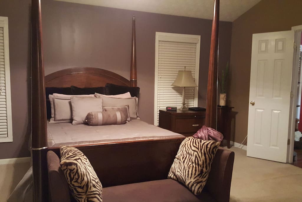 The lovely Master Bedroom has high ceilings which open into the master bathroom.