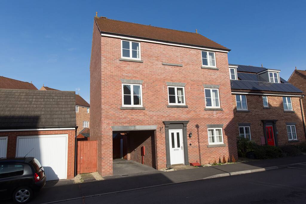 There is shared parking under the house and on the street outside
