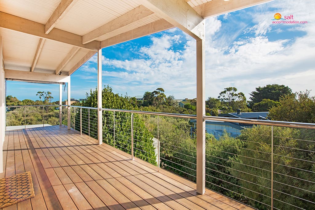 Tree top views with ocean glimpses on the horizon
