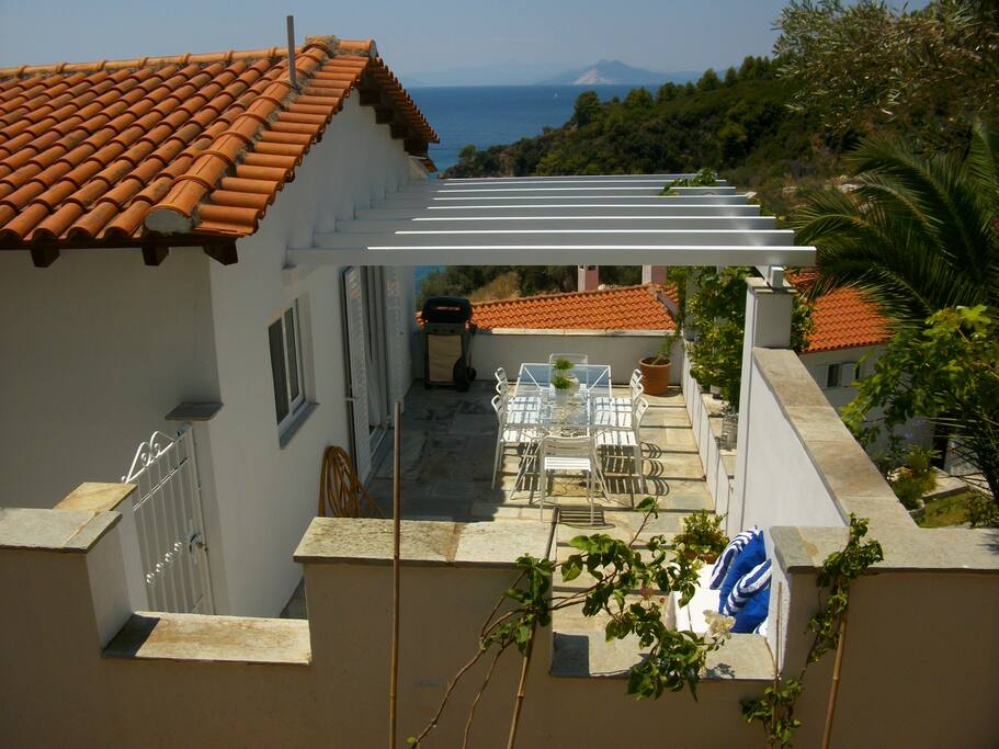 view to the house and the side terrace