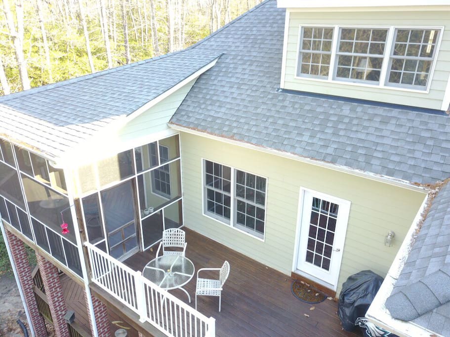 Rear view with screen porch to enjoy in weather
