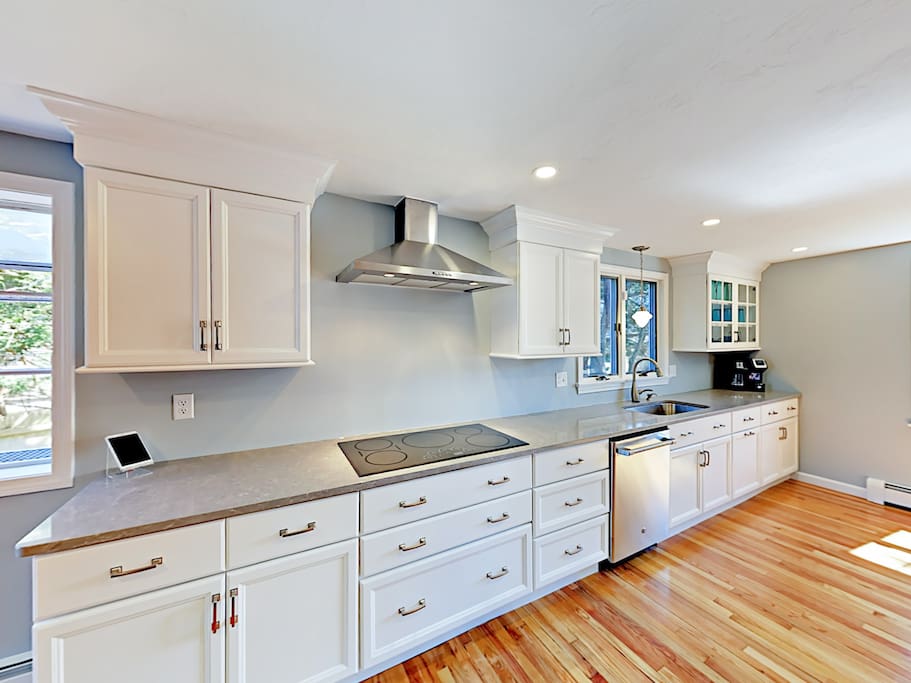 The well-equipped kitchen includes a starter supply of paper towels and dish soap for your convenience.