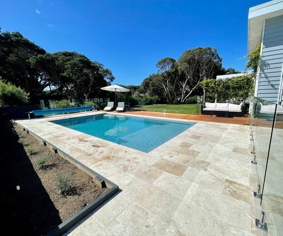 Coastal house with huge solar heated pool gallery image 2