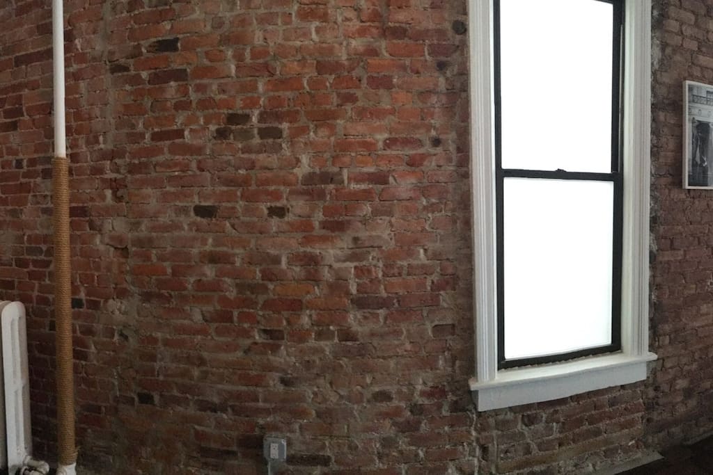A partial panorama of the east wall. The entire space is more than 60' long!