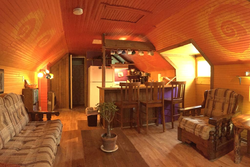 Lofted ceiling and unique colors make this space warm and cozy.