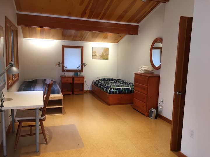 MH, 2nd floor, 2nd bedroom with two twin beds and space for playing. soft cork floor, great lighting allows kids play LEGO on the floor