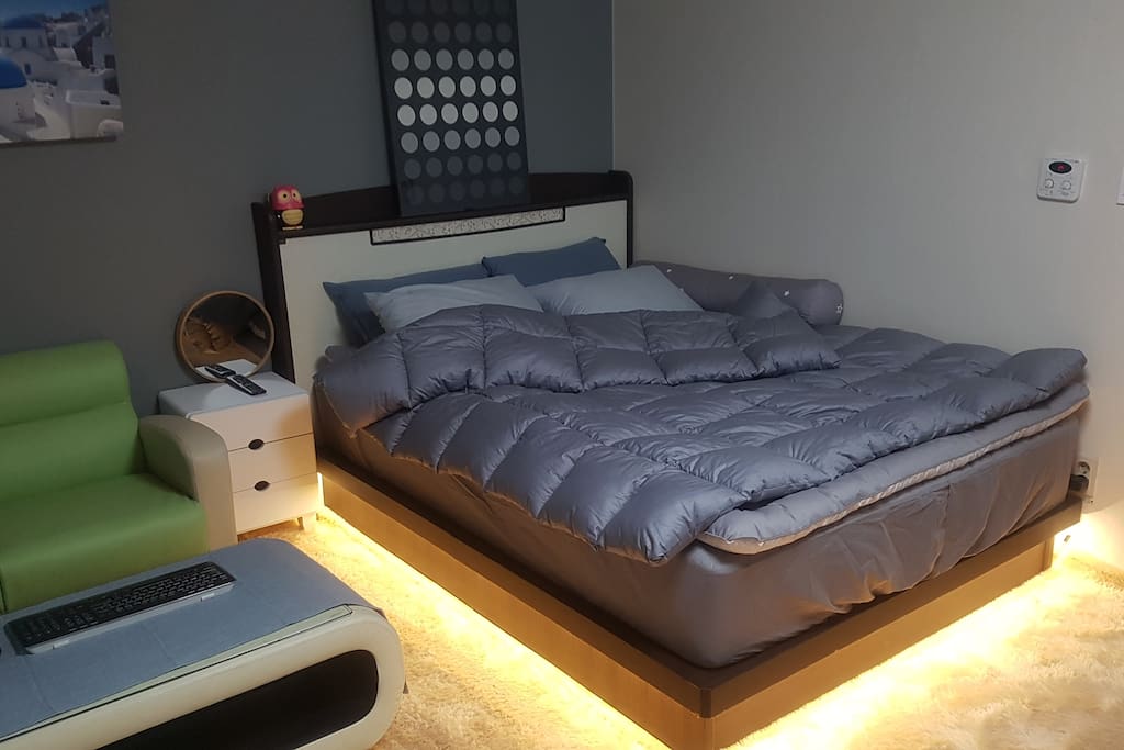 #Main Bed Room (1 Queen size bed with LED light, Sofa, TV, Make up Table, Coat Hanger)