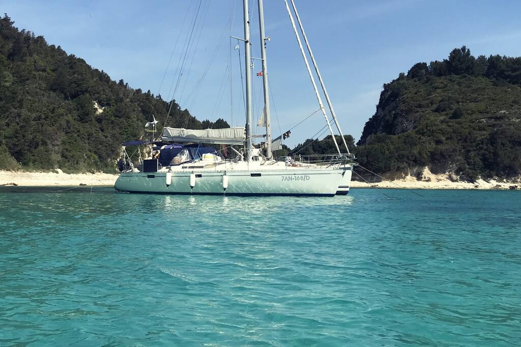 Gentilina, our sailboat, at anchor in Lakka