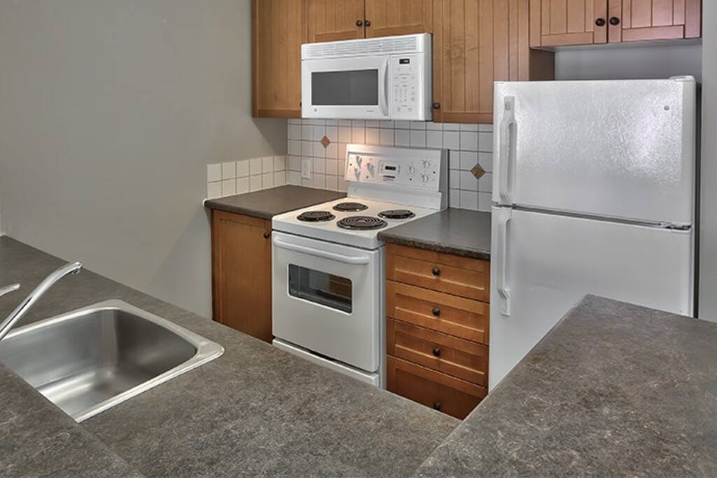Cook meals in the fully-equipped kitchen