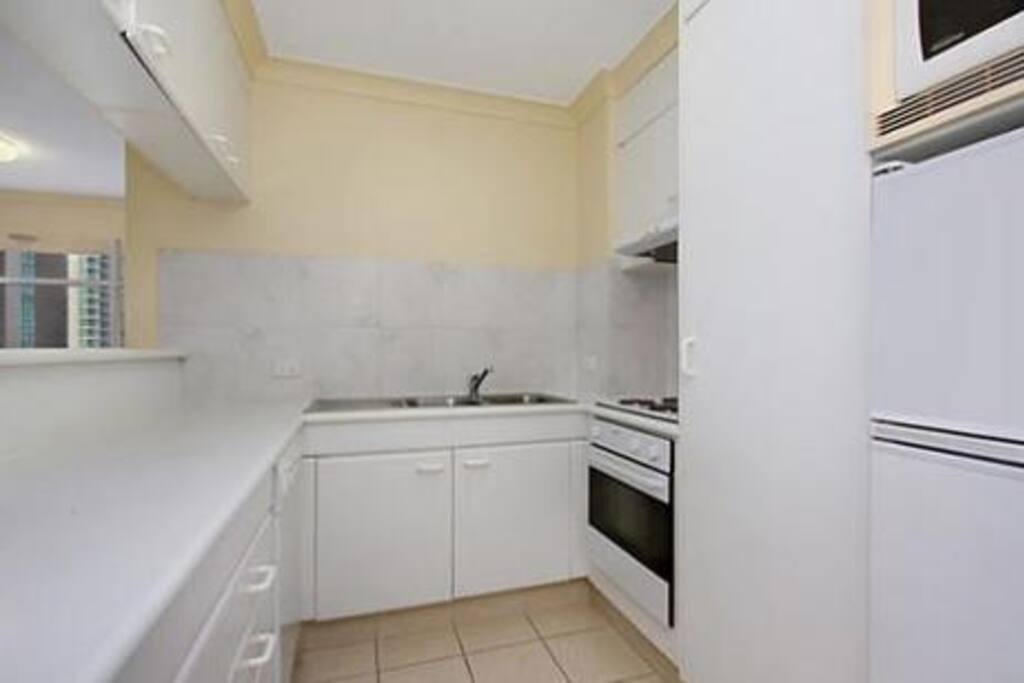 Fully equipped kitchen with microwave oven