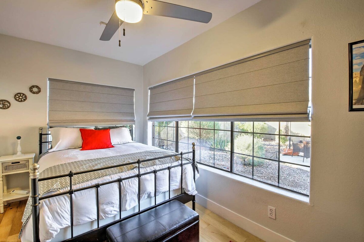 Hoofdslaapkamer met uitzicht op HET ZWEMBAD en de achtertuin