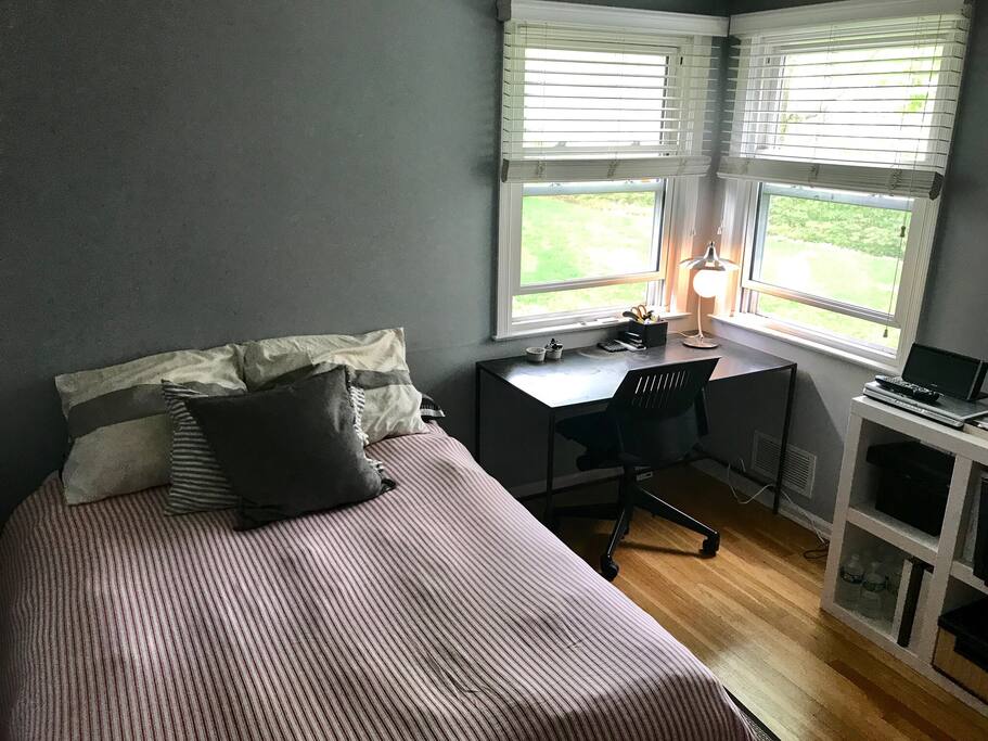 One bedroom with desk and T.V.