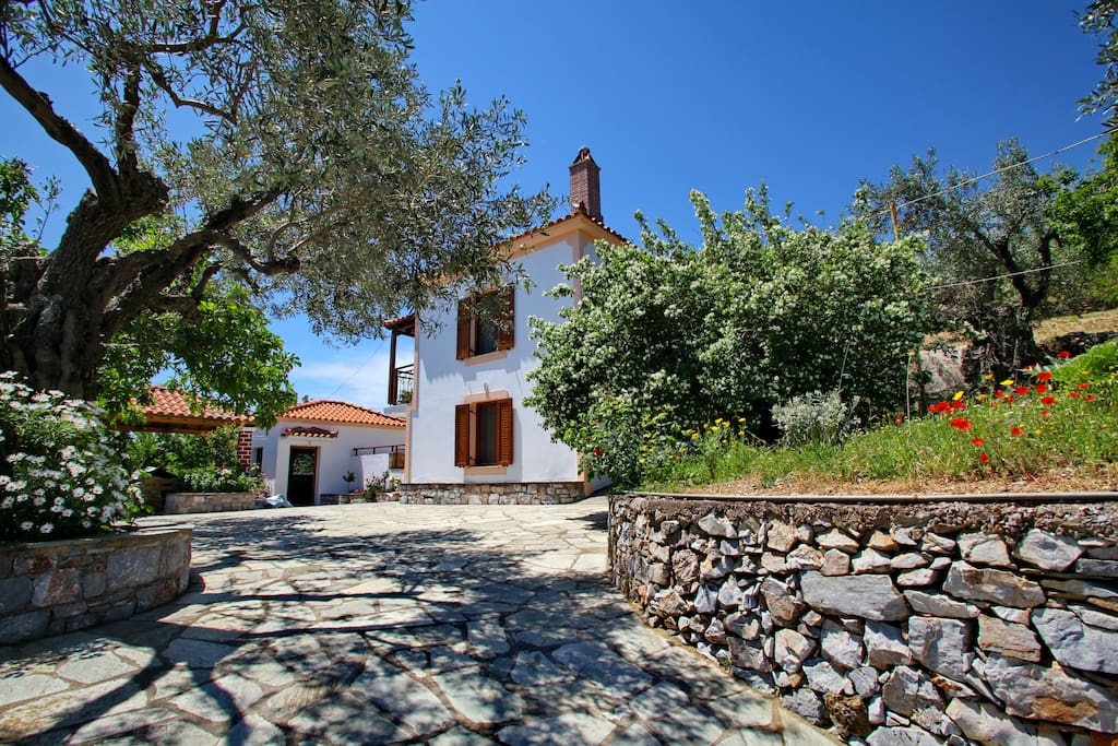 The cottage is set within a private fenced plot.