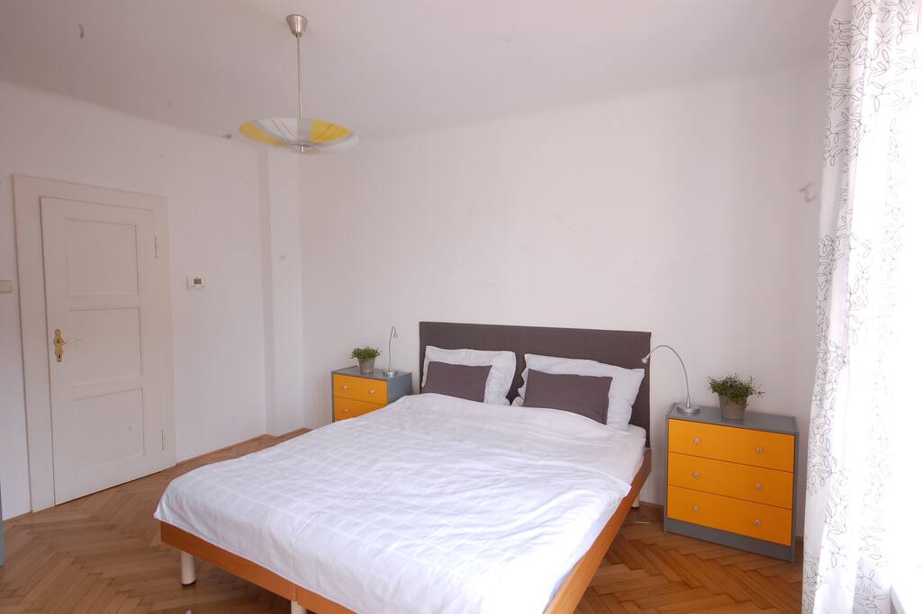 the main bedroom after we have repainted the walls