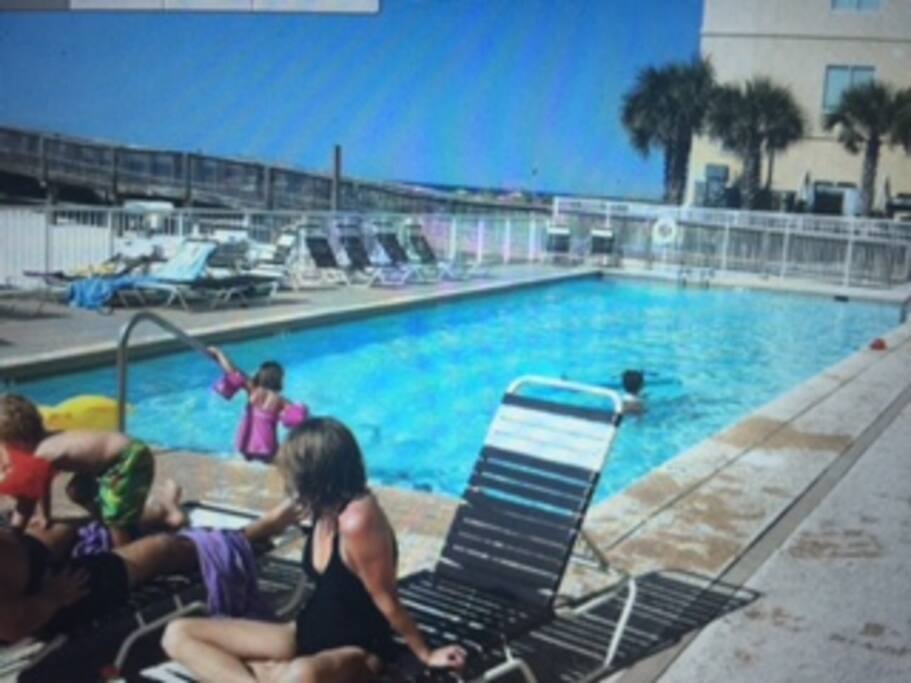 Huge heated outdoor pool and deck