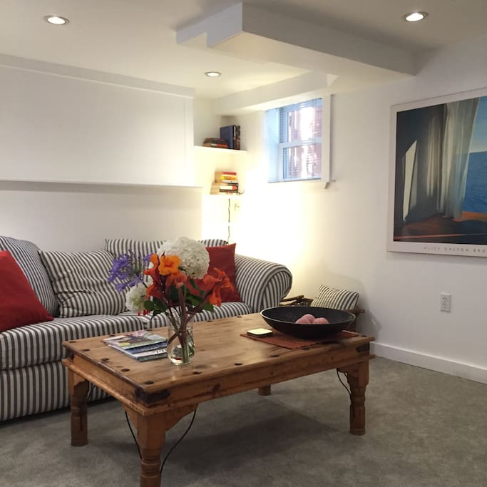 The living area with brand new carpeting and paint!