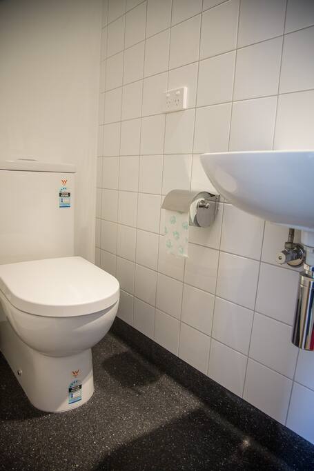 New self-contained bathroom including shower.