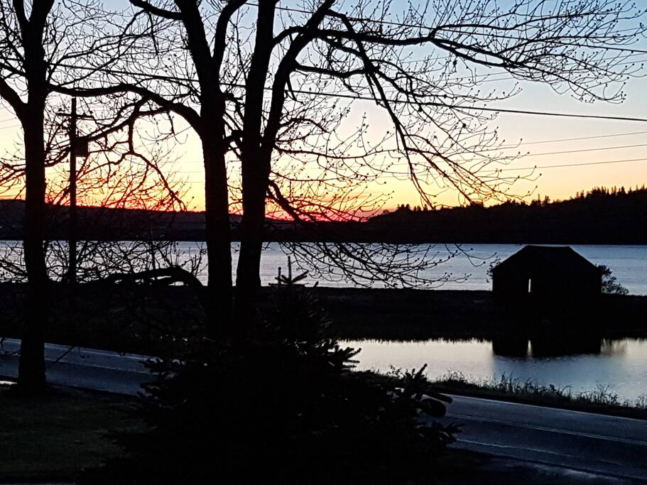 Wake up to spectacular sunrises... view from the house looking across to the water!
