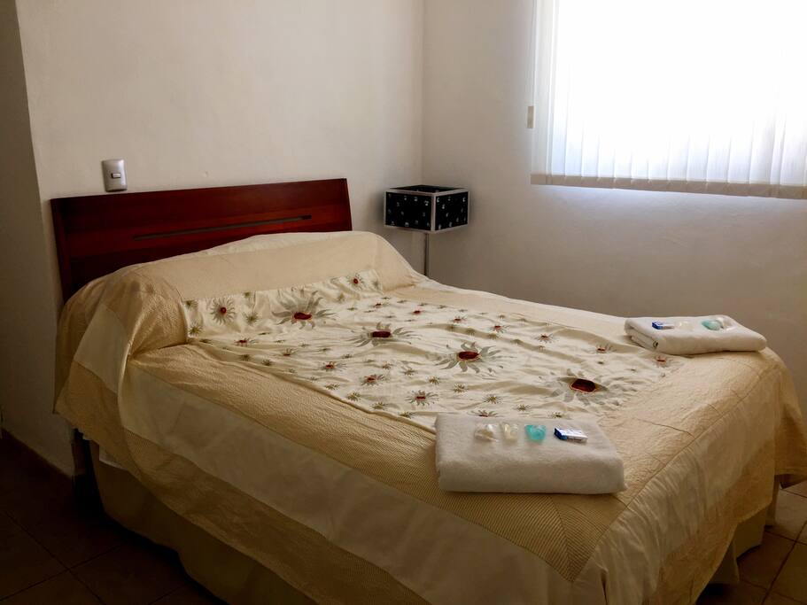 Master Bedroom with Queen Size Bed and en-suite bathroom.