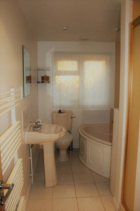 Private bathroom with separate shower cubicle