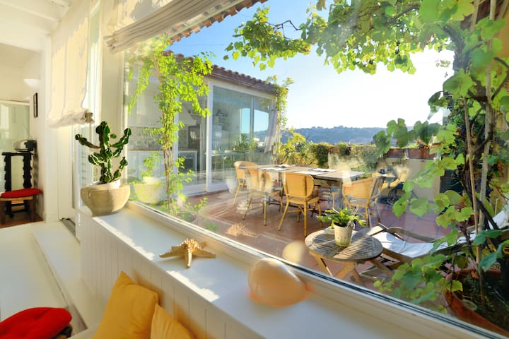 Panoramic and charming house with terraces