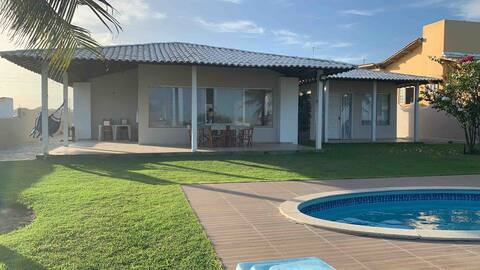 HOUSE BY THE SEA ON THE BEACH OF THE BAG WITH A SWIMMING POOL