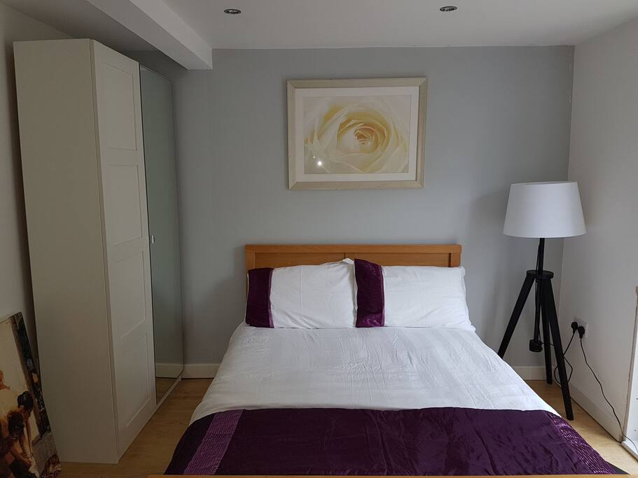 Double bed with wardrobe