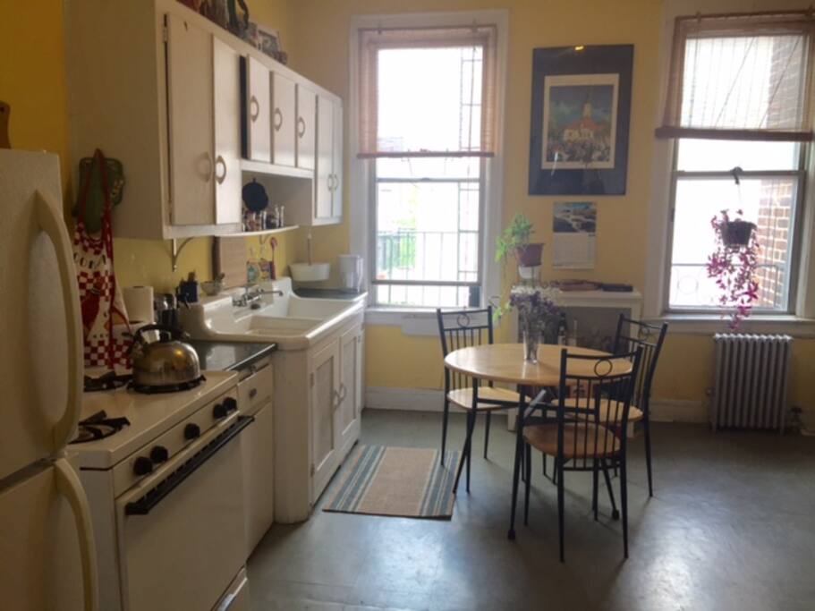 The kitchen is huge! Very well lit.