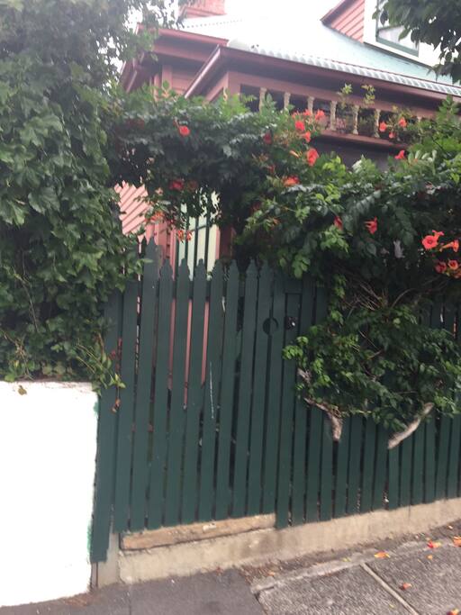 Stable entrance gate- small owl left on gate.