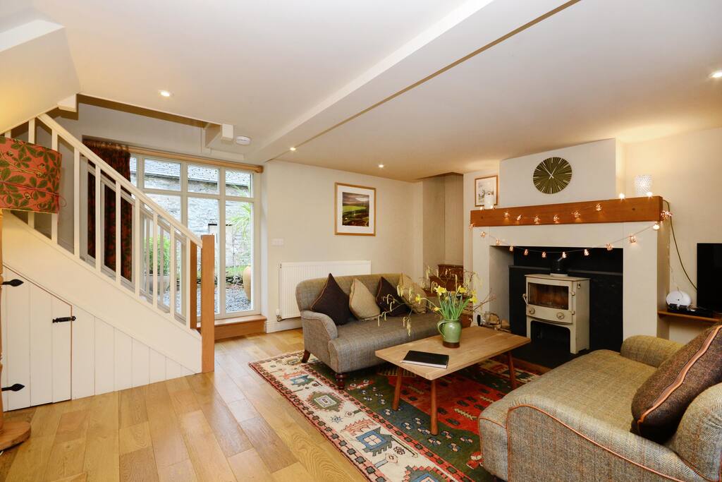 lounge and stove with rural views