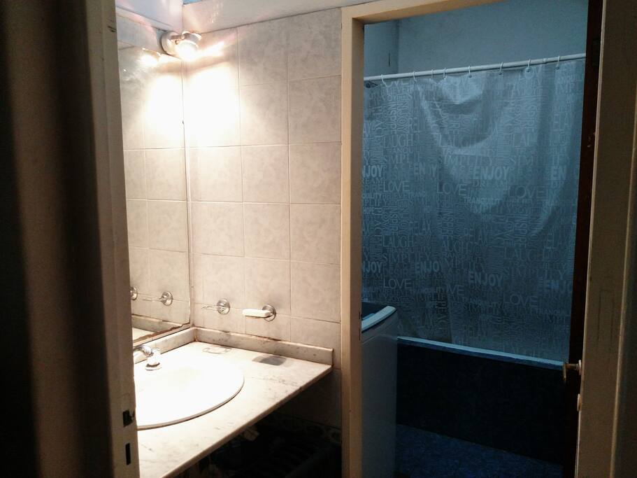 baño con ante baño y bañera