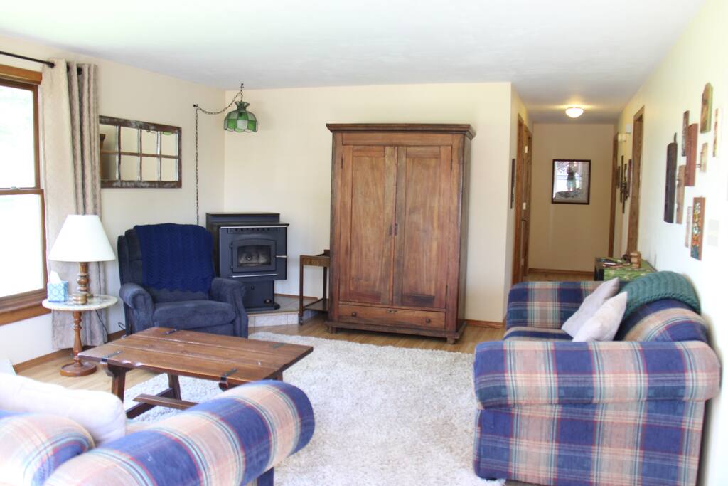 Living room all set up for curling up with a good book, watching movies or board games.