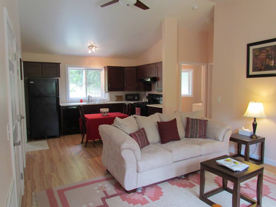 The bright, airy great-room with vaulted ceiling gives you space to breathe.