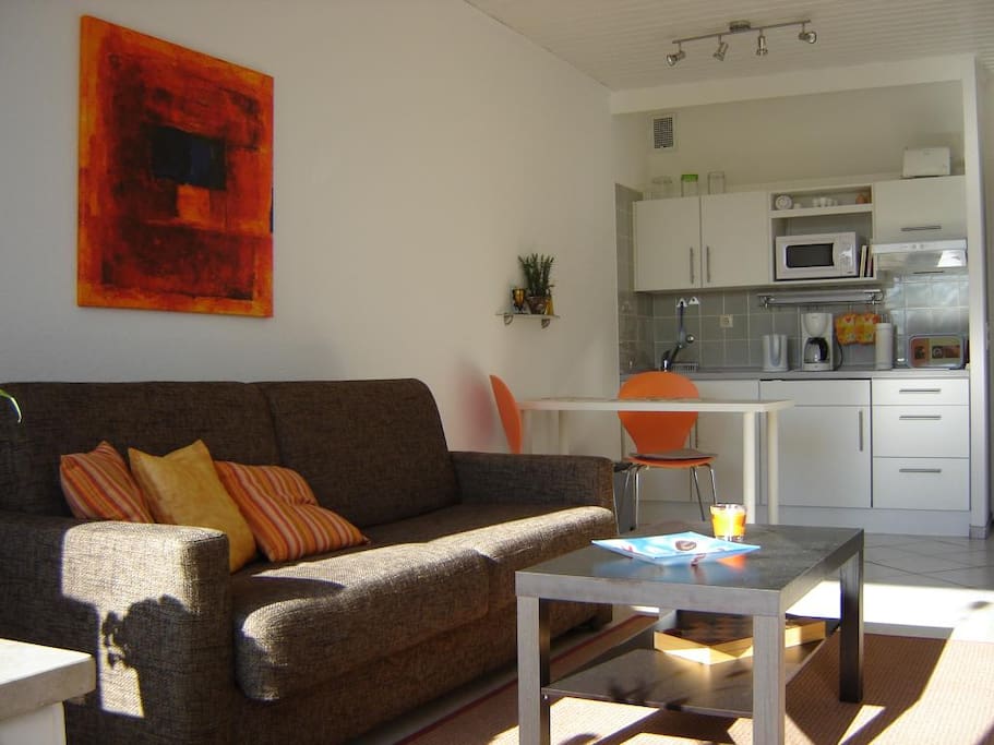 Living room with Kitchen