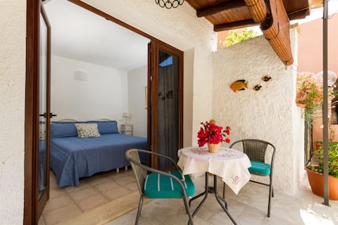 Successful Airbnb property: Lovely small apartment with garden in Villasimius