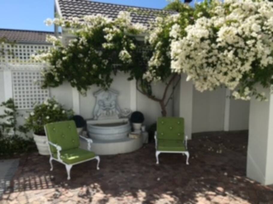 Fountain and outdoor sunny Patio