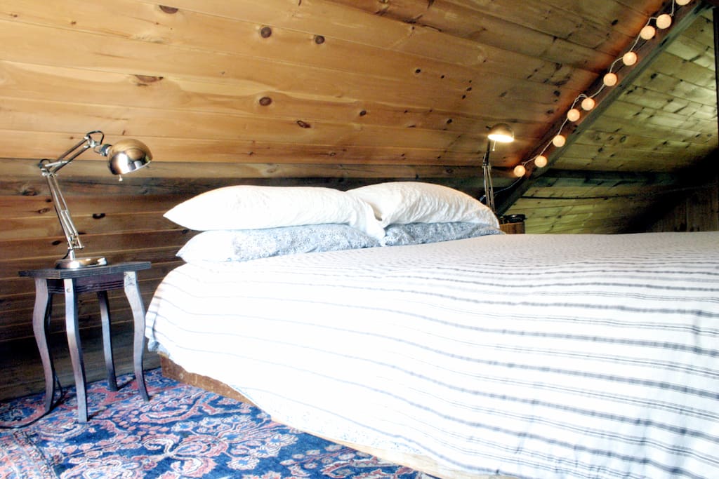 Our guests consistently tell us they love the queen sized bed in the cabin's loft. In the winter we put LL bean flannel on for maximum coziness.