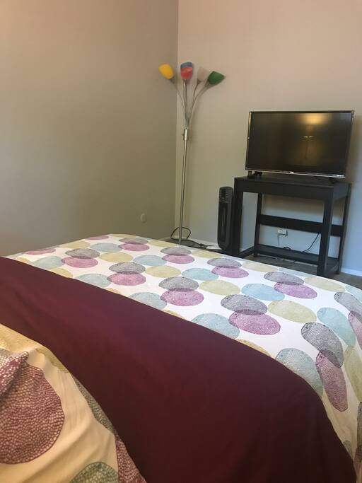 Bedroom has tv with Netflix and Hulu