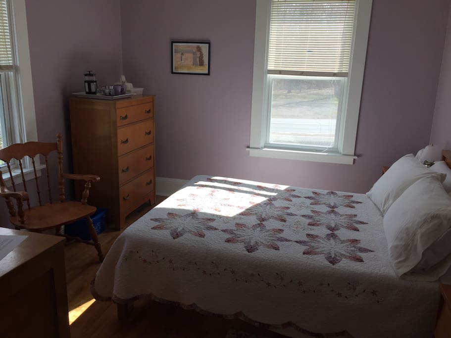 Double bedroom has two windows & overlooks pollinator meadow & Information Centre picnic park