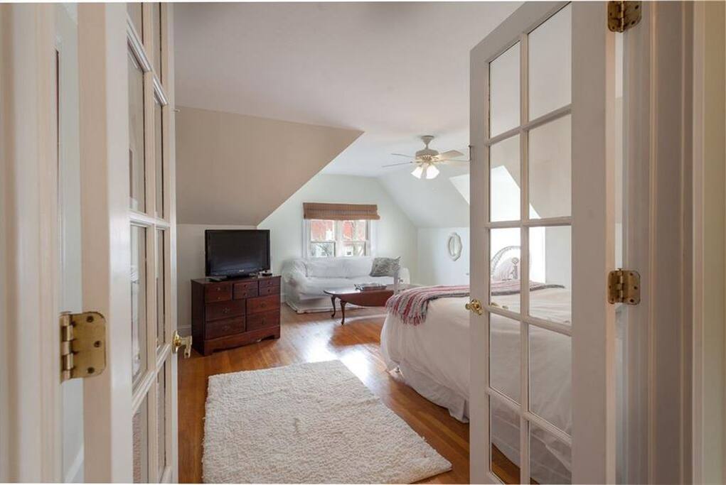 Enter bedroom one through beautiful glass doors.