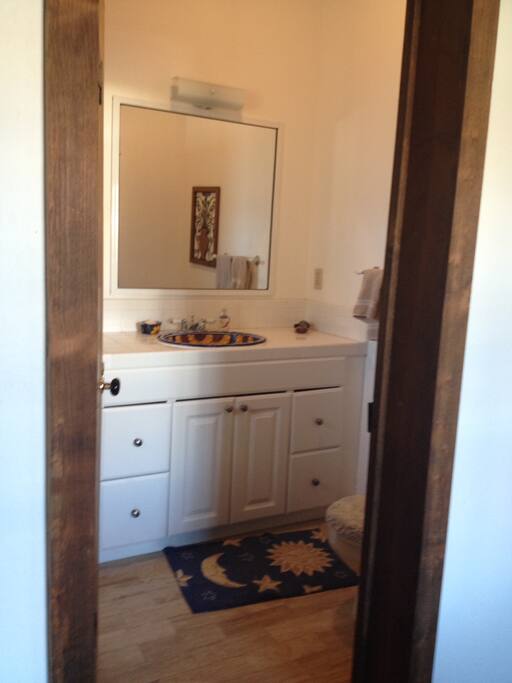 3 Full baths with distinct tile sinks