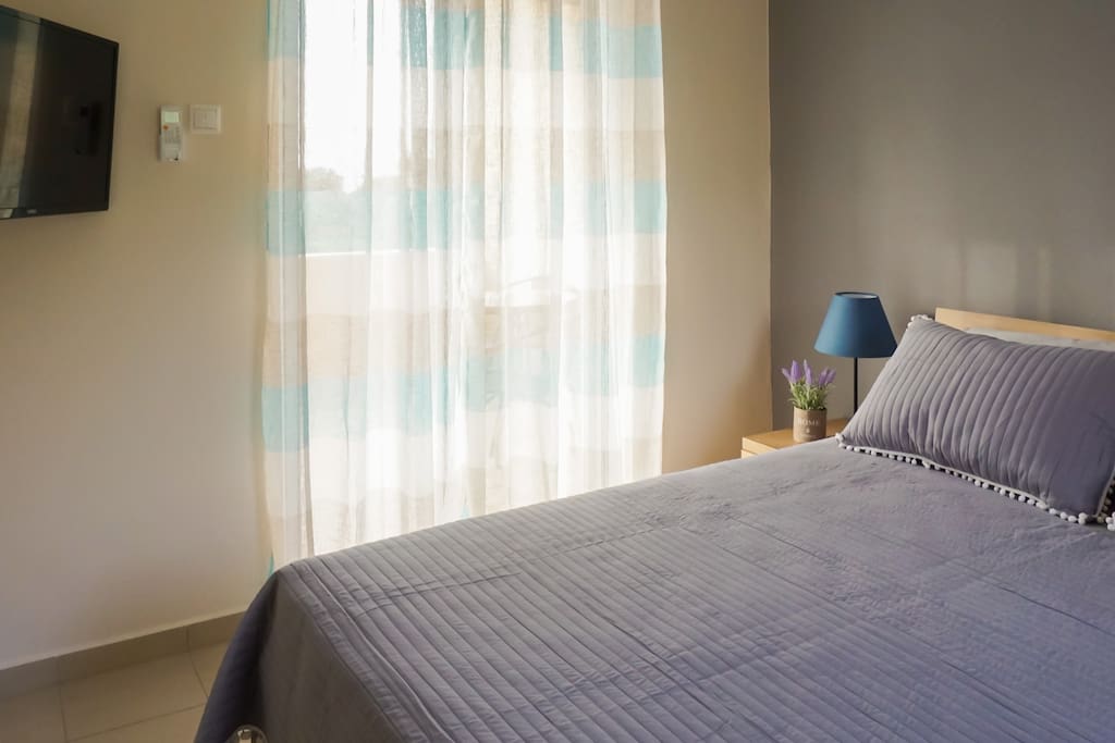 The king size bed (Bedroom #1) with a very comfy matres where you can sleep (like a baby) after a long day at the beach :)