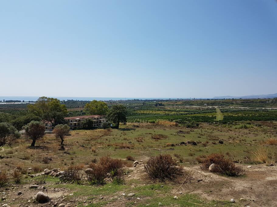 View of apartment from hill
